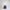 Éclosion – Lampe sculpturale en PLA mat avec base nervurée et abat-jour transparent.